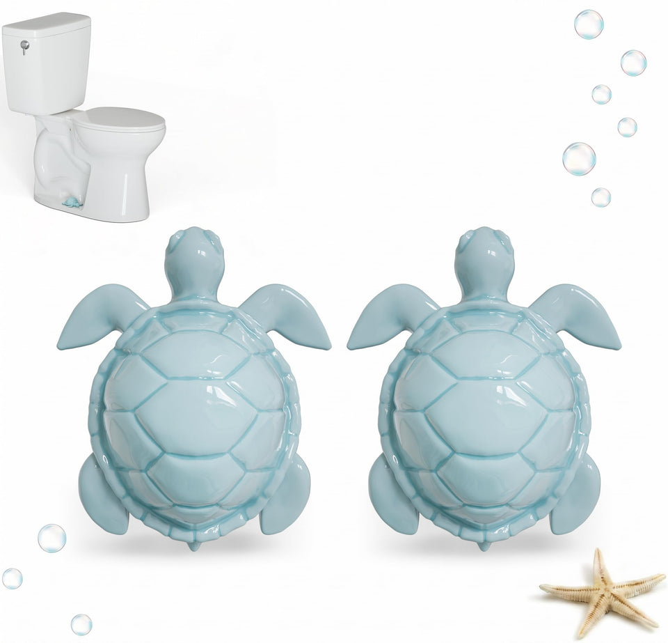 Boeemi turtle bolt covers in glossy ceramic sea turtle add coastal charm to bathrooms.