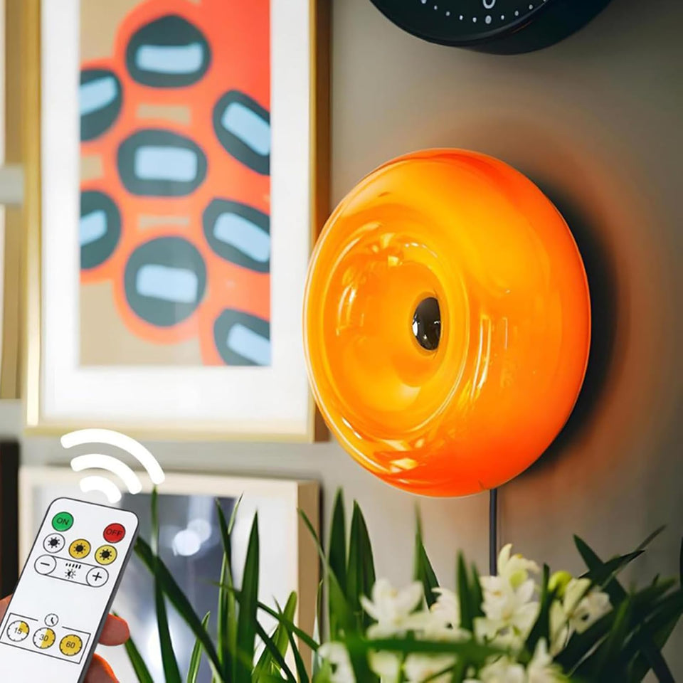 Bofea orange donut lamp on wall provides warm ambient lighting for living rooms.