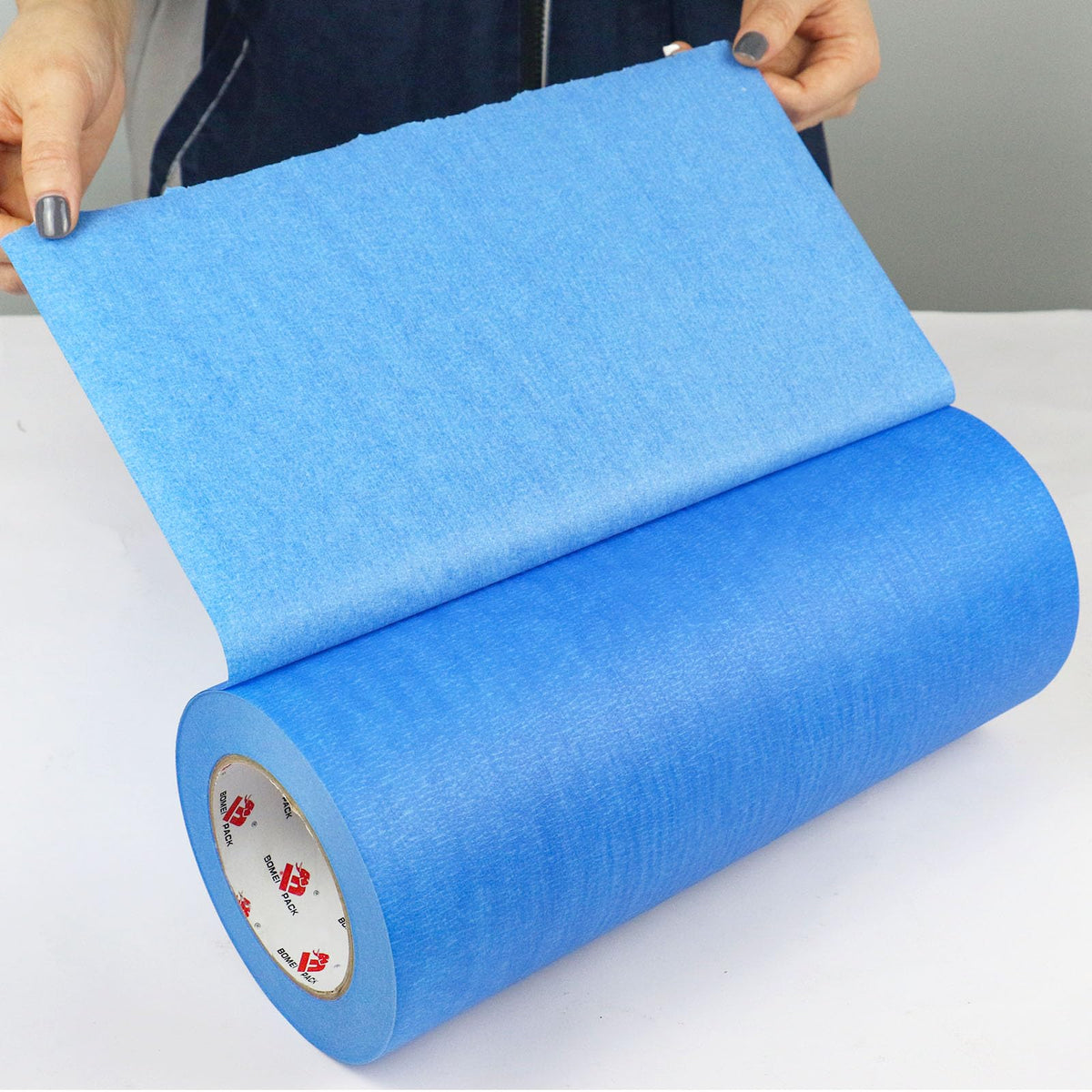 BOMEI PACK wide masking tape showing clean removal from a surface
