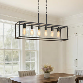 Boncoo 6-light black chandelier over dining table for modern farmhouse ambiance.