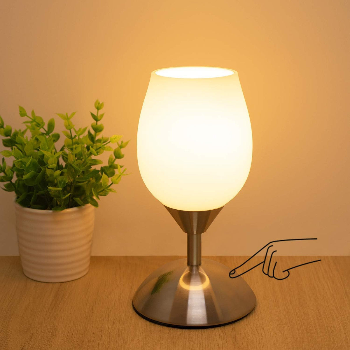 Boncoo small touch lamp on bedside nightstand with warm ambient light