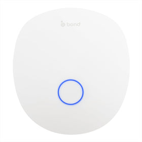 Bond Bridge Pro on wall enabling centralized smart control of fans and shades across rooms.