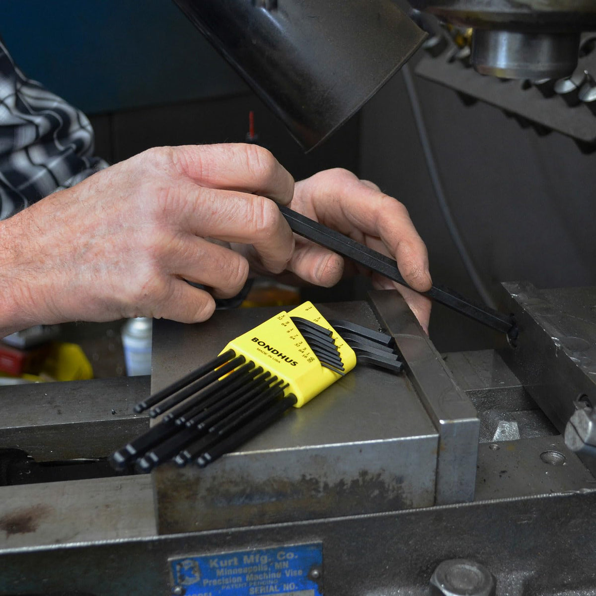 Ball-end wrenches at 25-degree angle for continuous turning in tight spots.