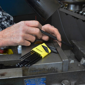 Ball-end wrenches at 25-degree angle for continuous turning in tight spots.