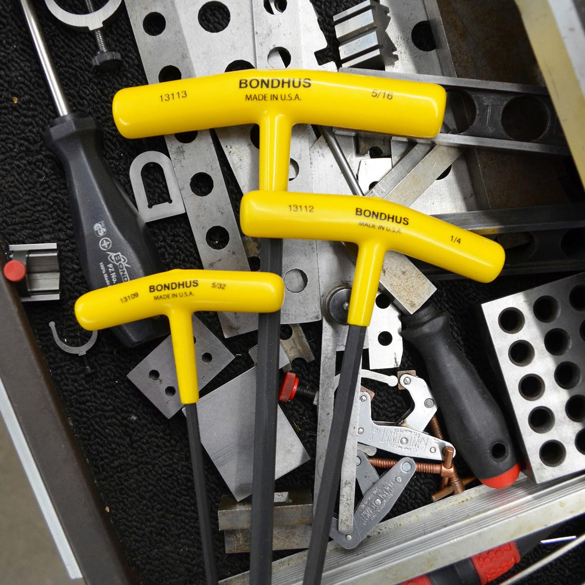 Wall-mount molded stand keeps Bondhus set within reach.