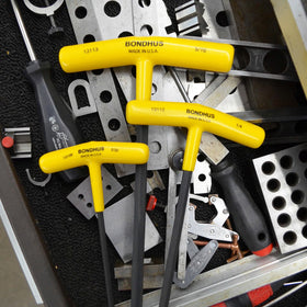Wall-mount molded stand keeps Bondhus set within reach.