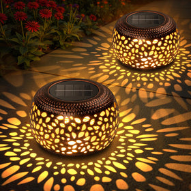 Bonlion solar lantern outdoor hollow pattern casting decorative light on pathway
