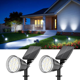 BONLION solar spot light outdoor bright beam highlighting trees and walkways at night