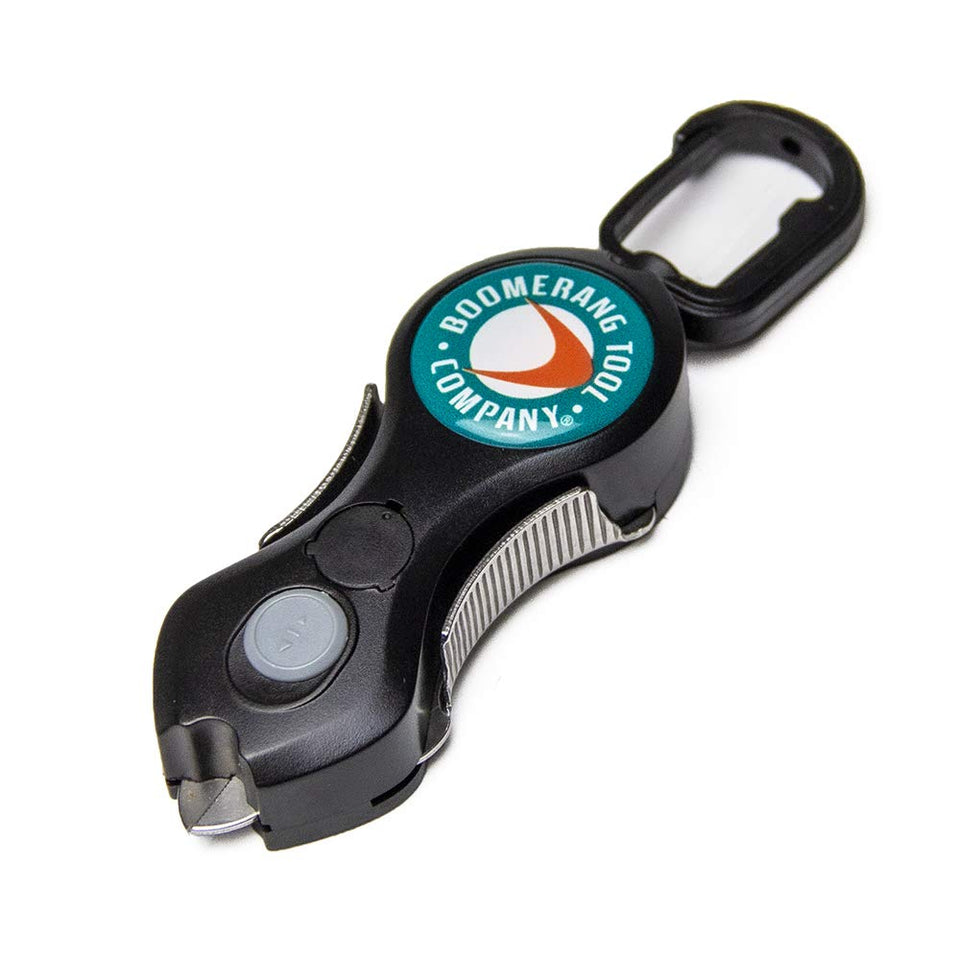Boomerang Tool Company Original Snip with LED Light in action, providing hands-free illumination for precise cuts.