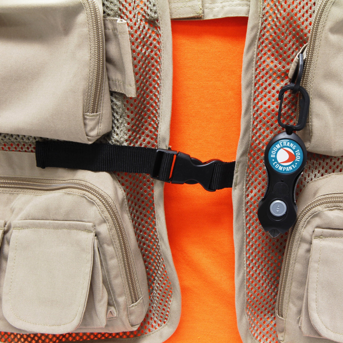 Boomerang Tool Company Original Snip showing the 36-inch retractable tether for quick access.