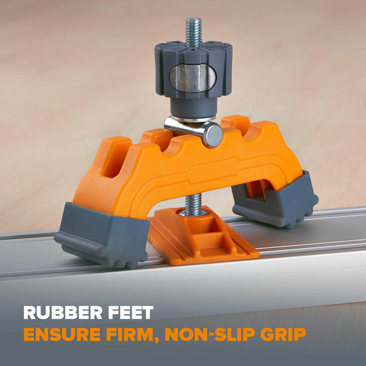 Non-marking feet protect plywood while securing the guide during cuts.
