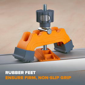 Non-marking feet protect plywood while securing the guide during cuts.