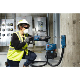 D-handle design aids comfort for overhead and downward drilling.