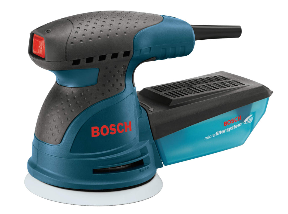 Bosch ROS10 5-inch sander in use for fast, even concrete removal.