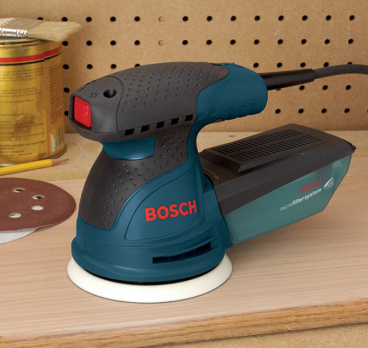 Bosch ROS20VSC hook-and-loop disc attachment for quick pad changes.
