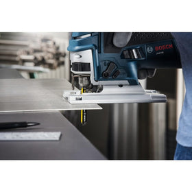 Bosch T118AHM3 carbide-edge blade cutting through stainless steel efficiently.