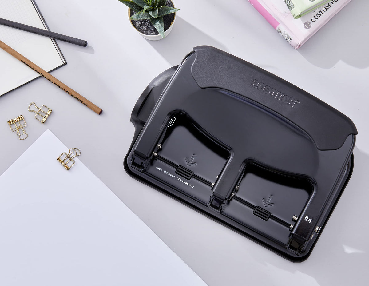 Bostitch 3-hole punch standard 9/32 inch holes for common binders.