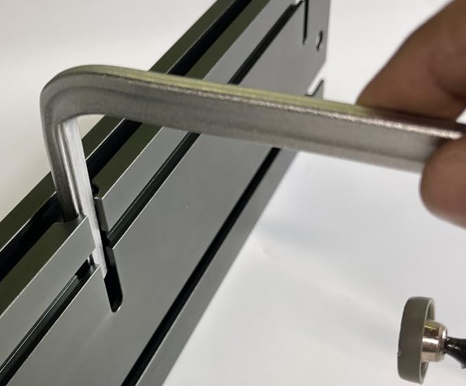 Close-up of XT2 clamp securing a fence for precise cuts.