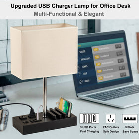 Briever lamp with wood base and two AC outlets suitable for small desks or rooms.