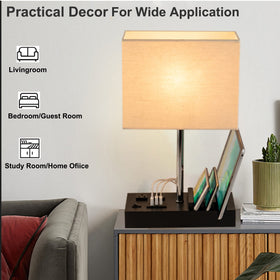 Briever lamp shows wooden phone stand integrated into the base for easy access.