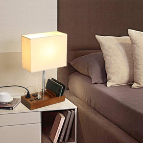Side angle view of Briever USB table lamp in a modern room.