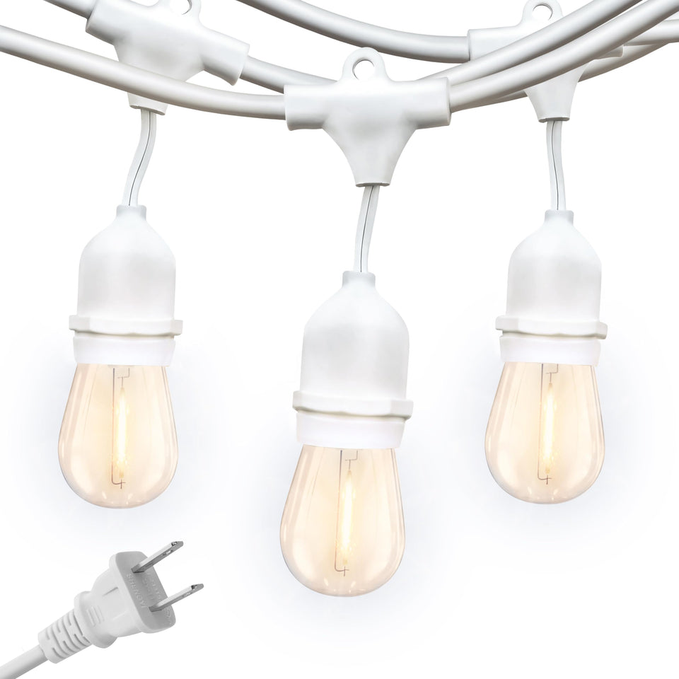 Brightech Ambience Pro outdoor lights hanging above a cozy patio for evenings.