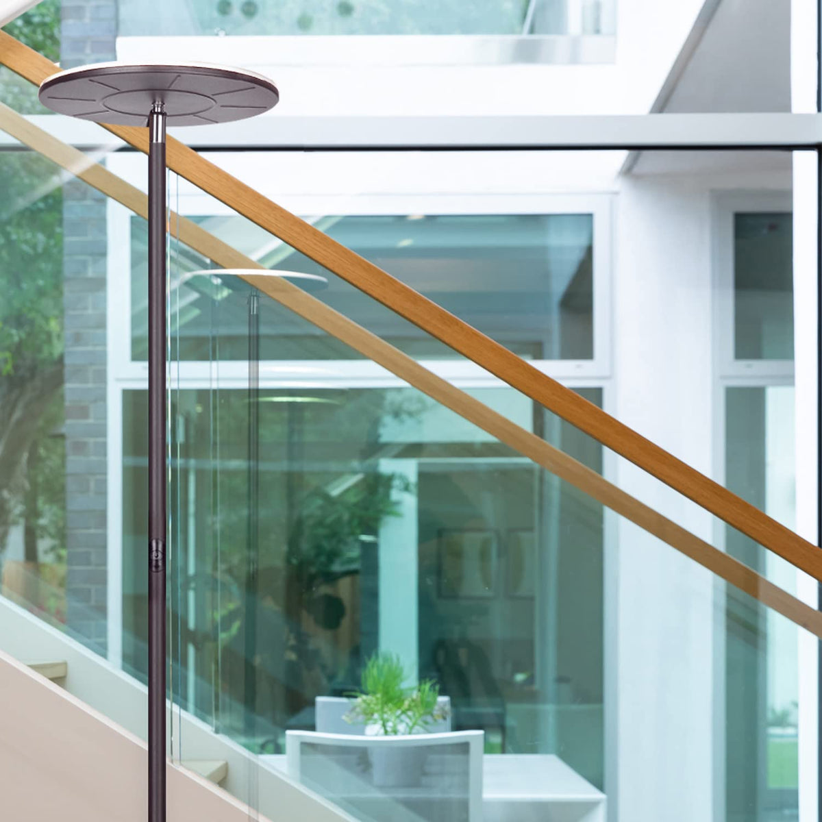 Brightech Sky floor lamp weighted base ensures stable, safe setup.