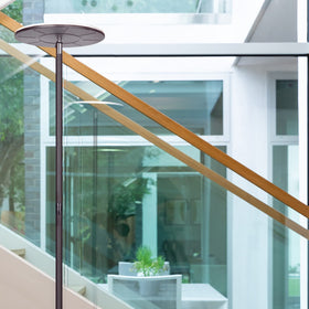 Brightech Sky floor lamp weighted base ensures stable, safe setup.