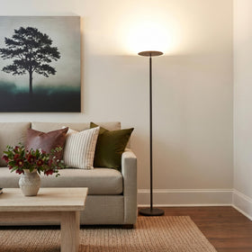Brightech Sky floor lamp with three‑way dimmer for customizable mood lighting.
