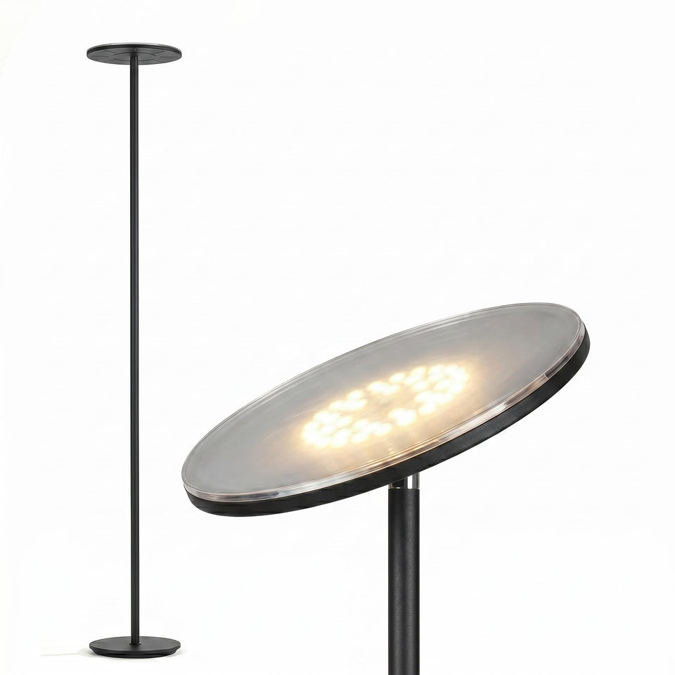 Brightech Sky floor lamp with torch head lit, ideal for reading in the living room.