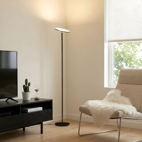 Brightech Sky floor lamp emits warm 3000K light for cozy evenings.
