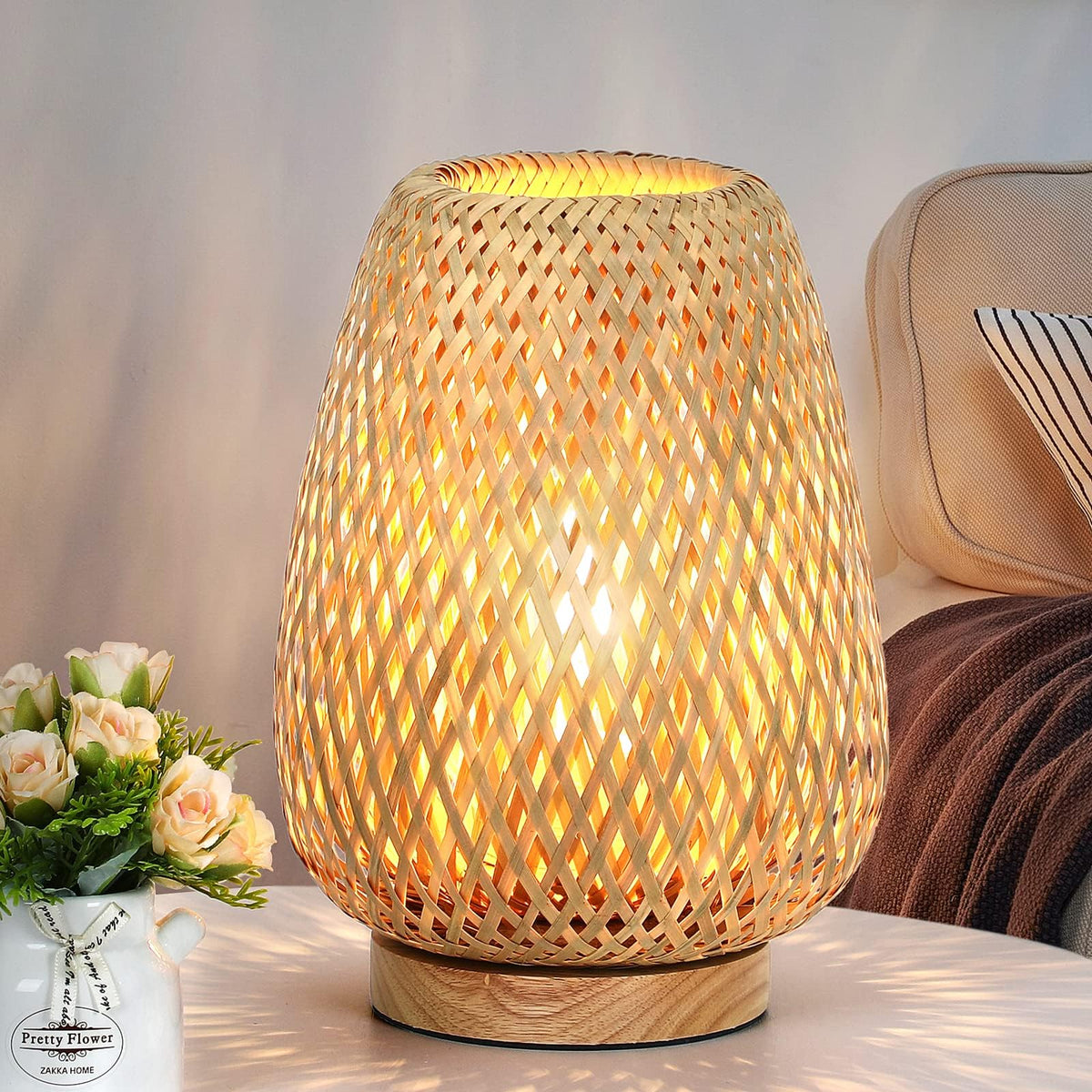 Brightever rattan table lamp with compact dimensions adds warm ambiance to a side table.
