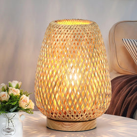 Brightever rattan table lamp with compact dimensions adds warm ambiance to a side table.