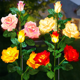 Brightown outdoor solar garden lights with rose flowers illuminate walkways with a romantic glow