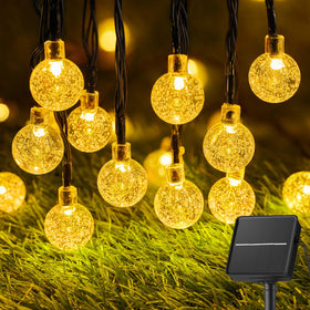 Brightown solar globe lights illuminate garden paths with a warm white glow