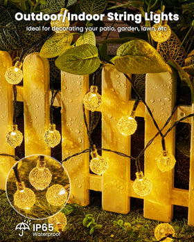 Brightown globe lights hanging on trees provide gentle nighttime illumination