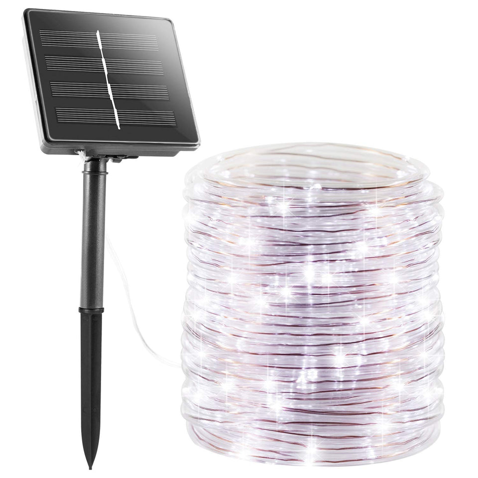 Brightown Solar Rope Lights wrapped around a tree for warm outdoor ambiance.