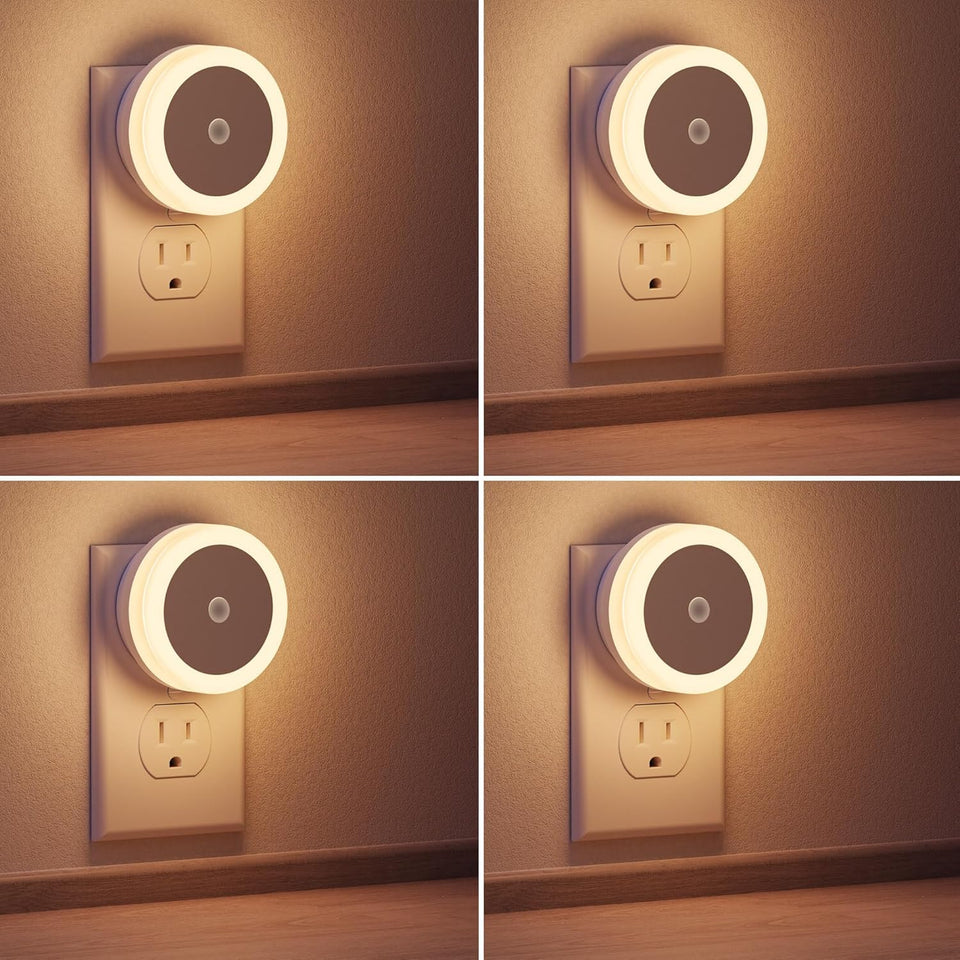 Briignite LED night light four-pack plugged into wall for space-saving illumination.