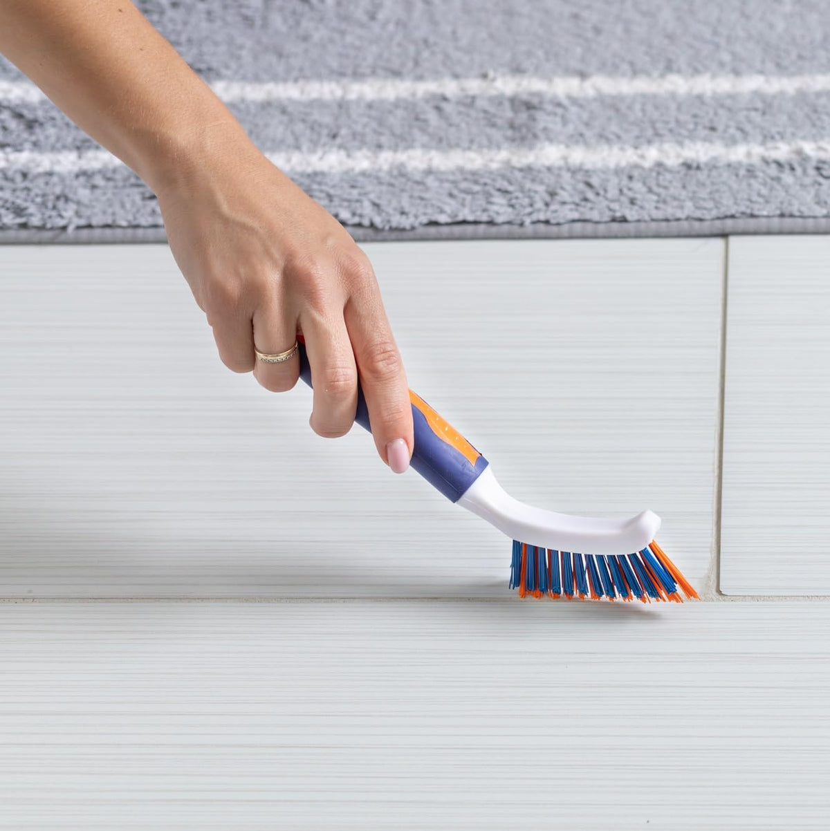 BRING IT ON! CLEANER grout brush works on sinks and countertops for everyday upkeep.