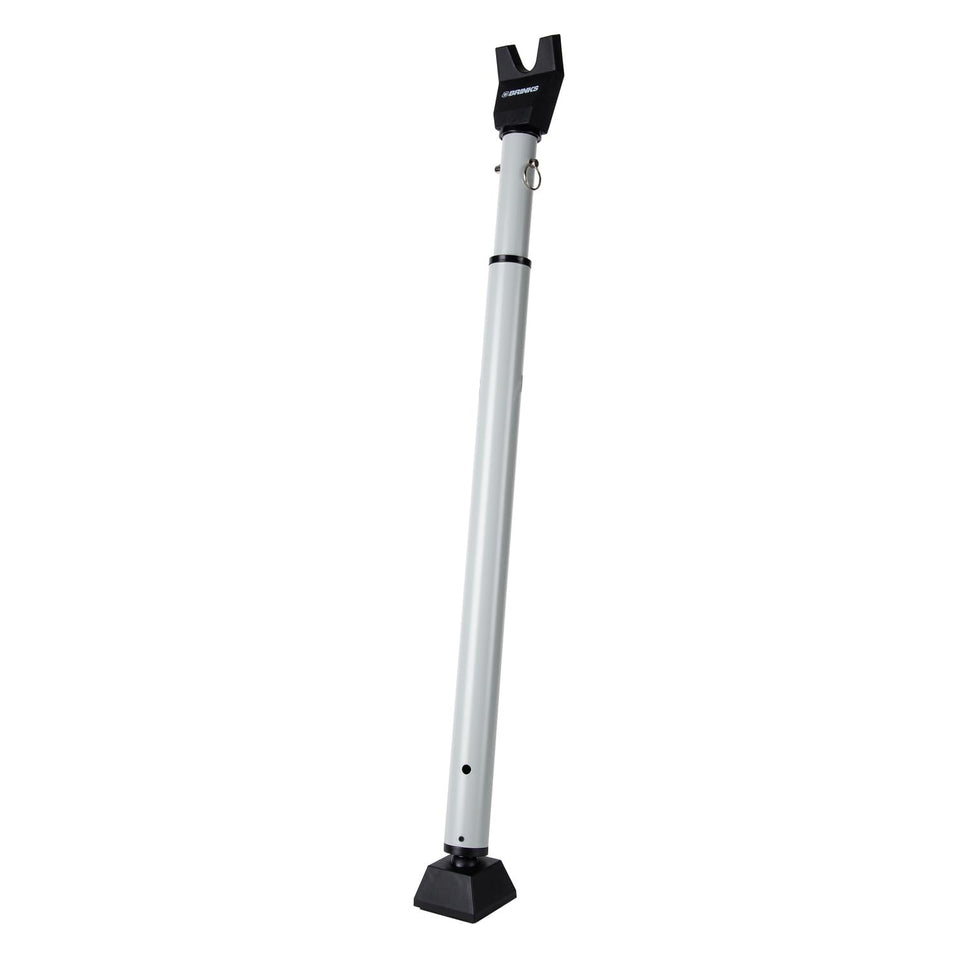 BRINKS door security bar adjustable 25 to 43 inches securing a hinged door.