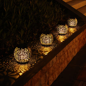 Brizled solar lanterns install easily on trees, pergolas, or tabletops.