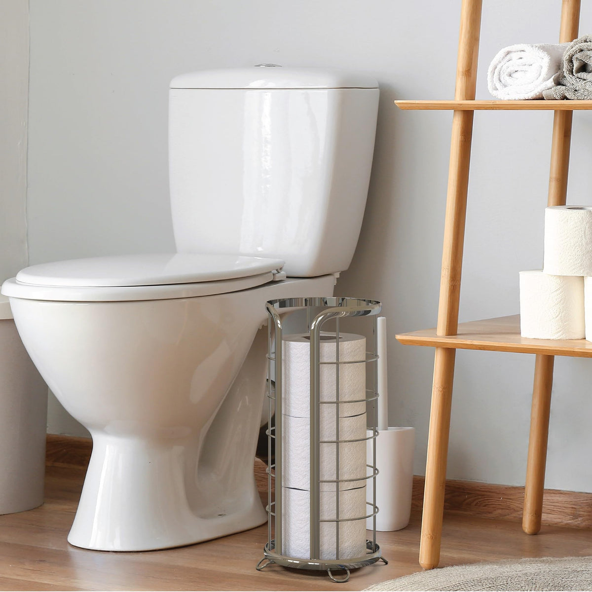 Brookstone chrome toilet paper holder mega-roll capacity fits three rolls neatly.