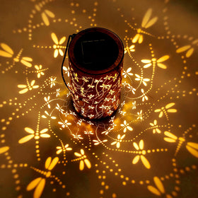 BSGlobal Dragonfly Solar Lantern close-up, antique finish and dragonfly cutouts.