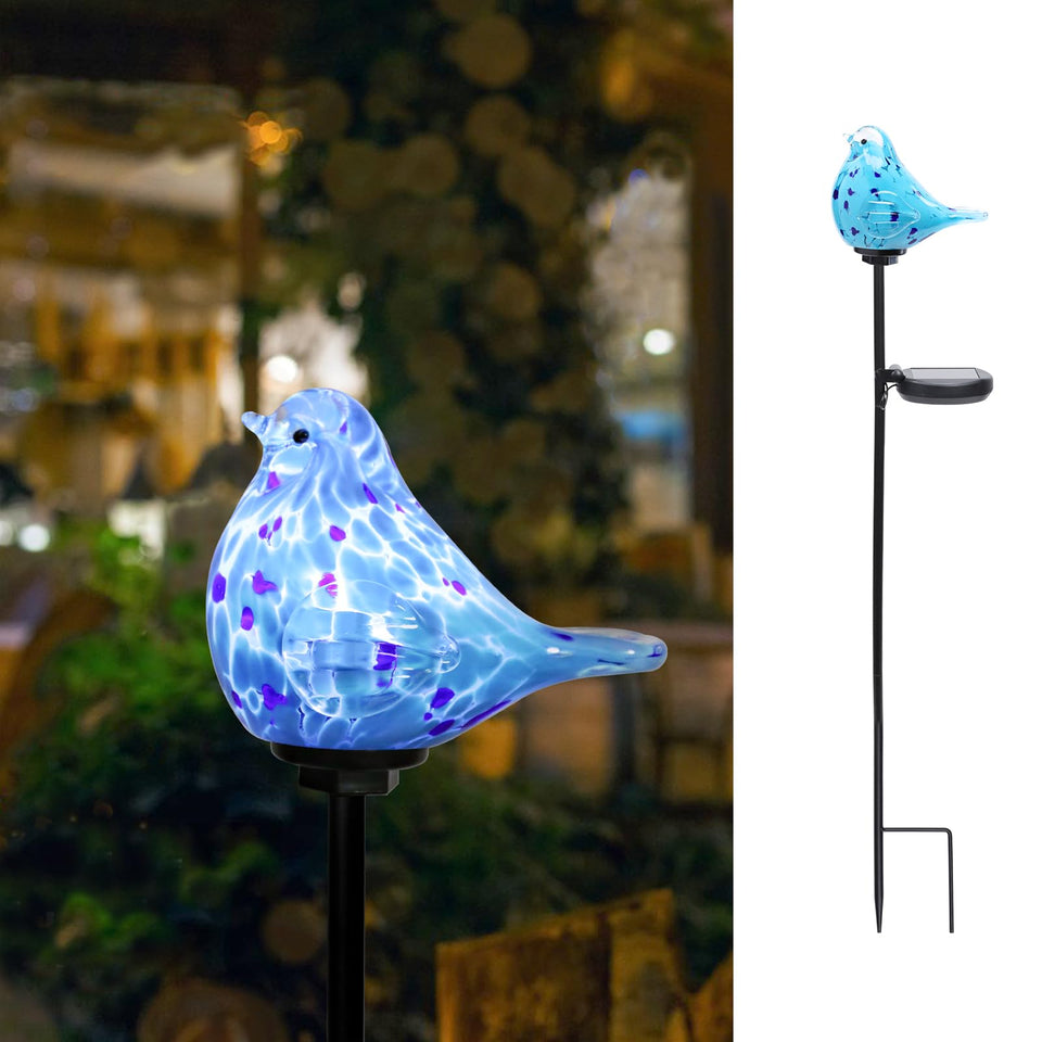 Bshine bluebird stake with hand blown glass brightens daytime paths.