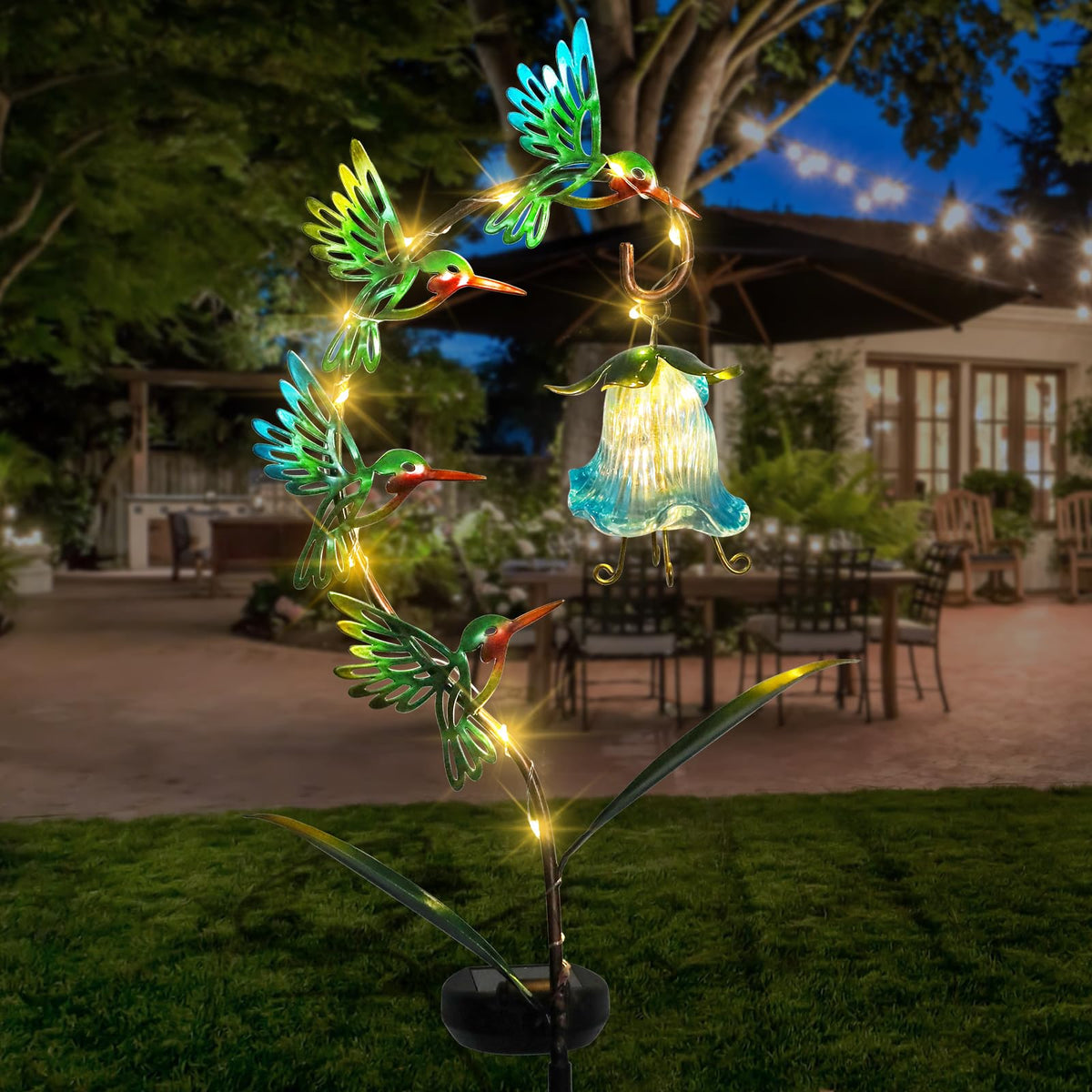 Bshine hummingbird yard ornament adds whimsy and soft illumination.