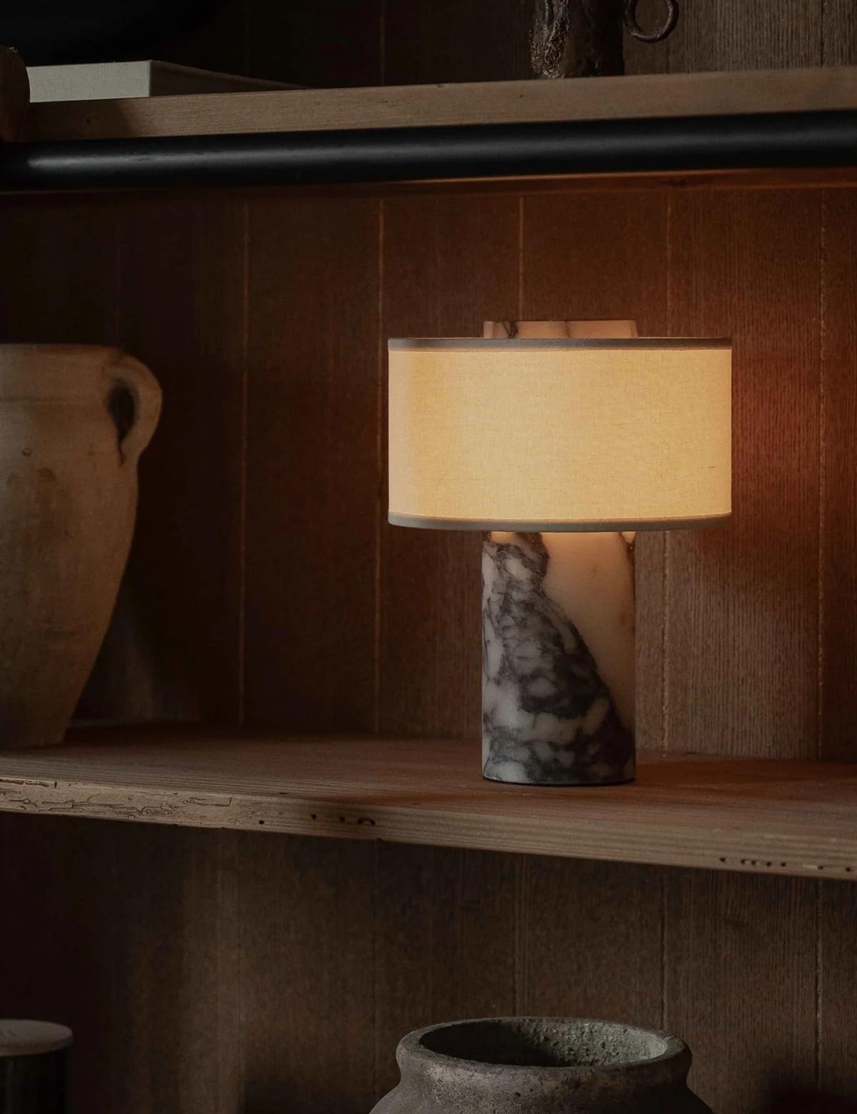 BSOD calacatta viola marble lamp, luxurious veining elevating upscale interiors.