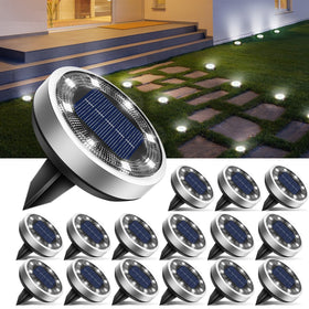btfarm solar disc light with 8 LEDs illuminating walkways