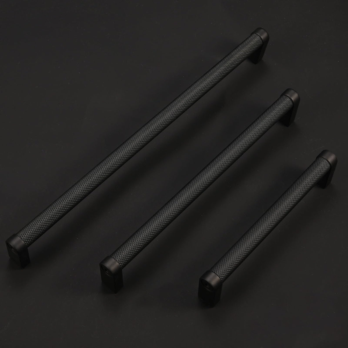 BUKOBYHE matte black pulls suit doors and drawers for a uniform look.