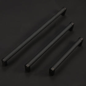 BUKOBYHE matte black pulls suit doors and drawers for a uniform look.