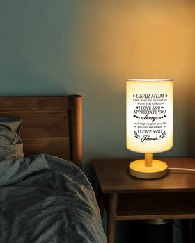 Calibron minimalist lamp base beige shade complements any decor style.